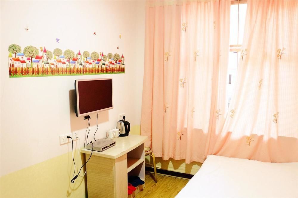 Qingdao Peninsula Four Seasons Business Hotel Εξωτερικό φωτογραφία
