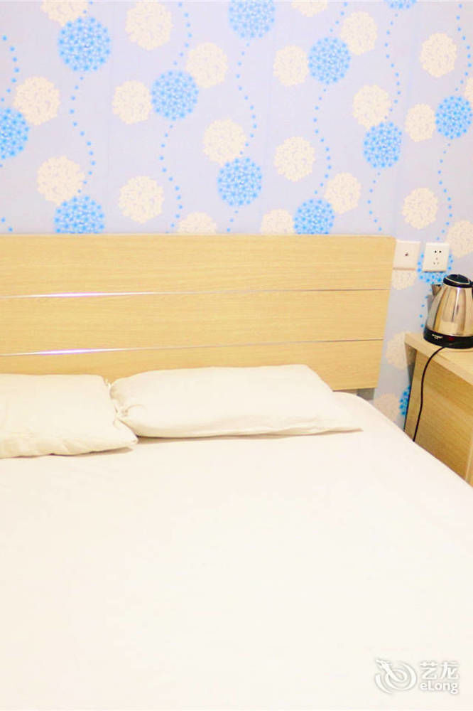 Qingdao Peninsula Four Seasons Business Hotel Εξωτερικό φωτογραφία
