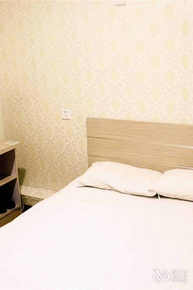 Qingdao Peninsula Four Seasons Business Hotel Εξωτερικό φωτογραφία