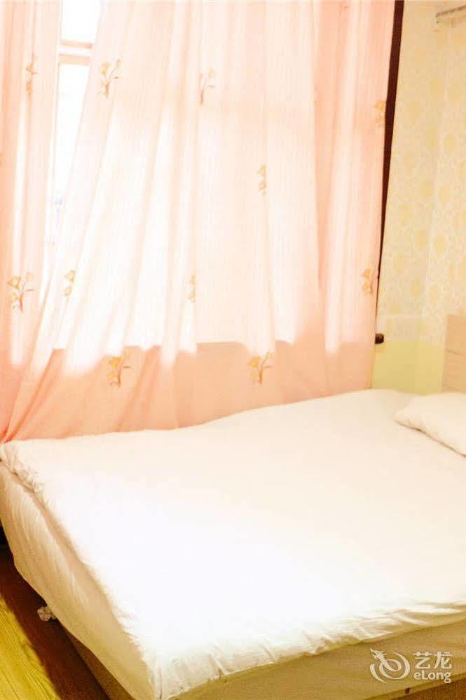 Qingdao Peninsula Four Seasons Business Hotel Εξωτερικό φωτογραφία