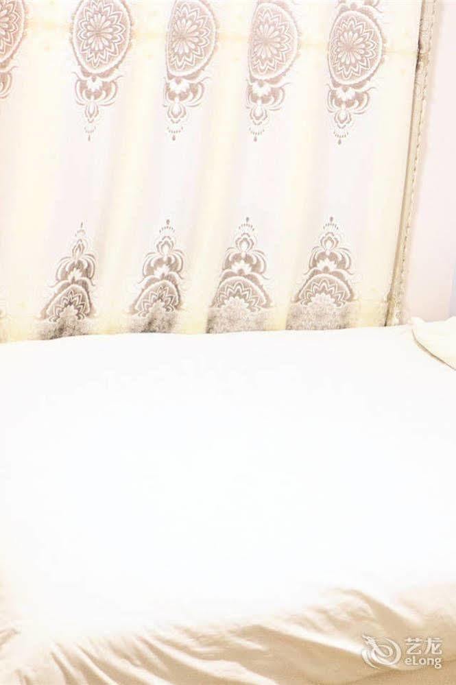 Qingdao Peninsula Four Seasons Business Hotel Εξωτερικό φωτογραφία